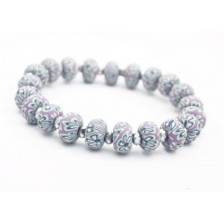Bracelet élastique perles violettes fimo fleurs et perle cristal